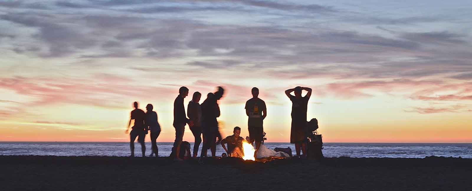 Sober teens on a beach.